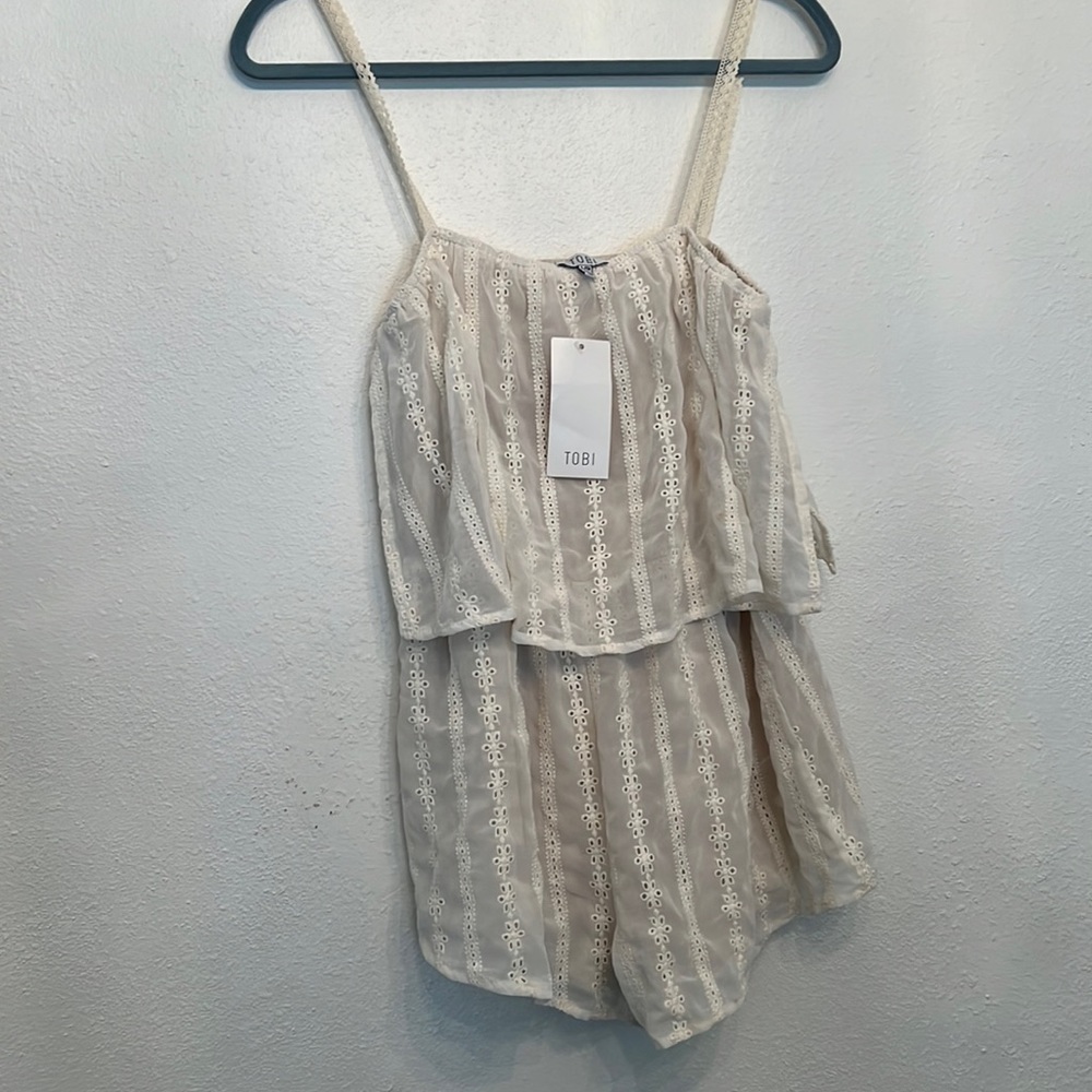 Tobi crème romper size L